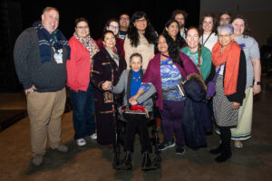 group of Indigenous members with the Elder at ACPA19