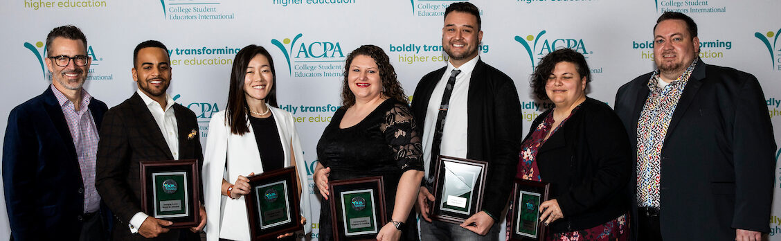 photo of all 2020 emerging scholars holding their awards at ACPA20