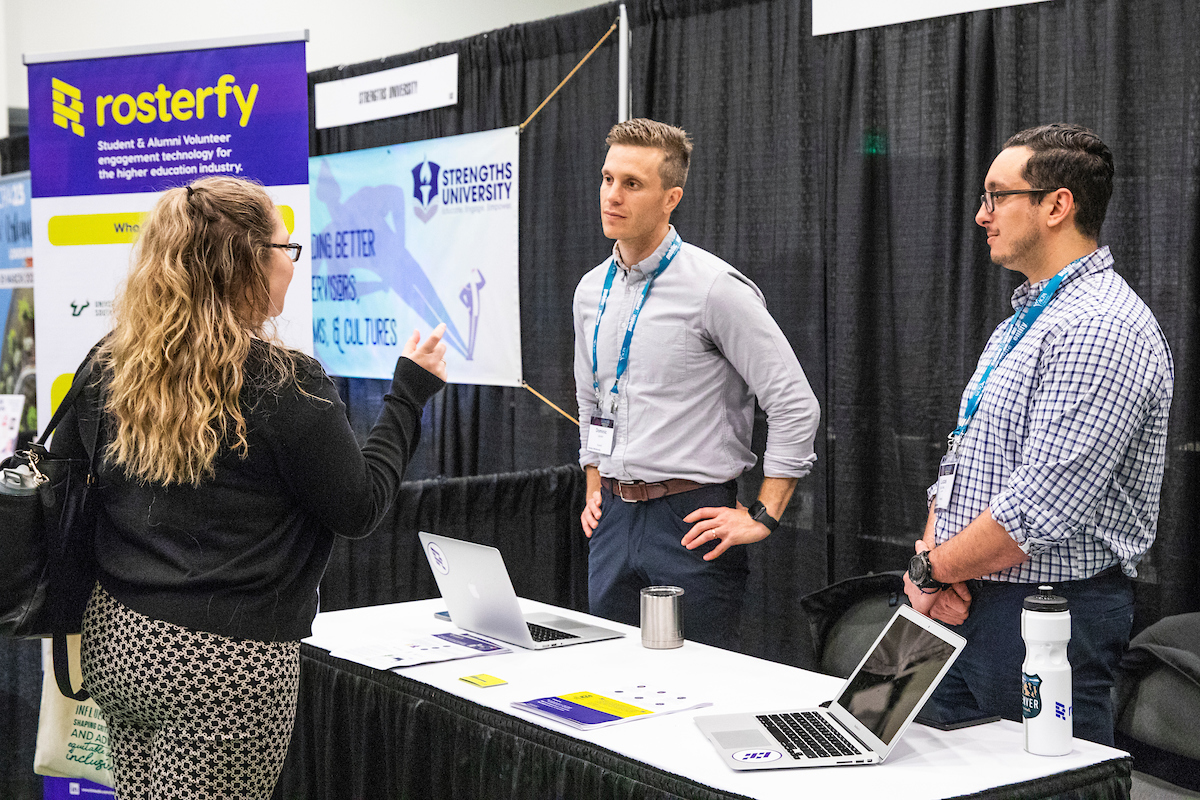 individuals interacting at ACPA20 in the Marketplace