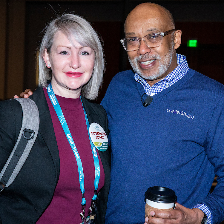 Laura Arroyo and Vernon Wall smiling for a photo