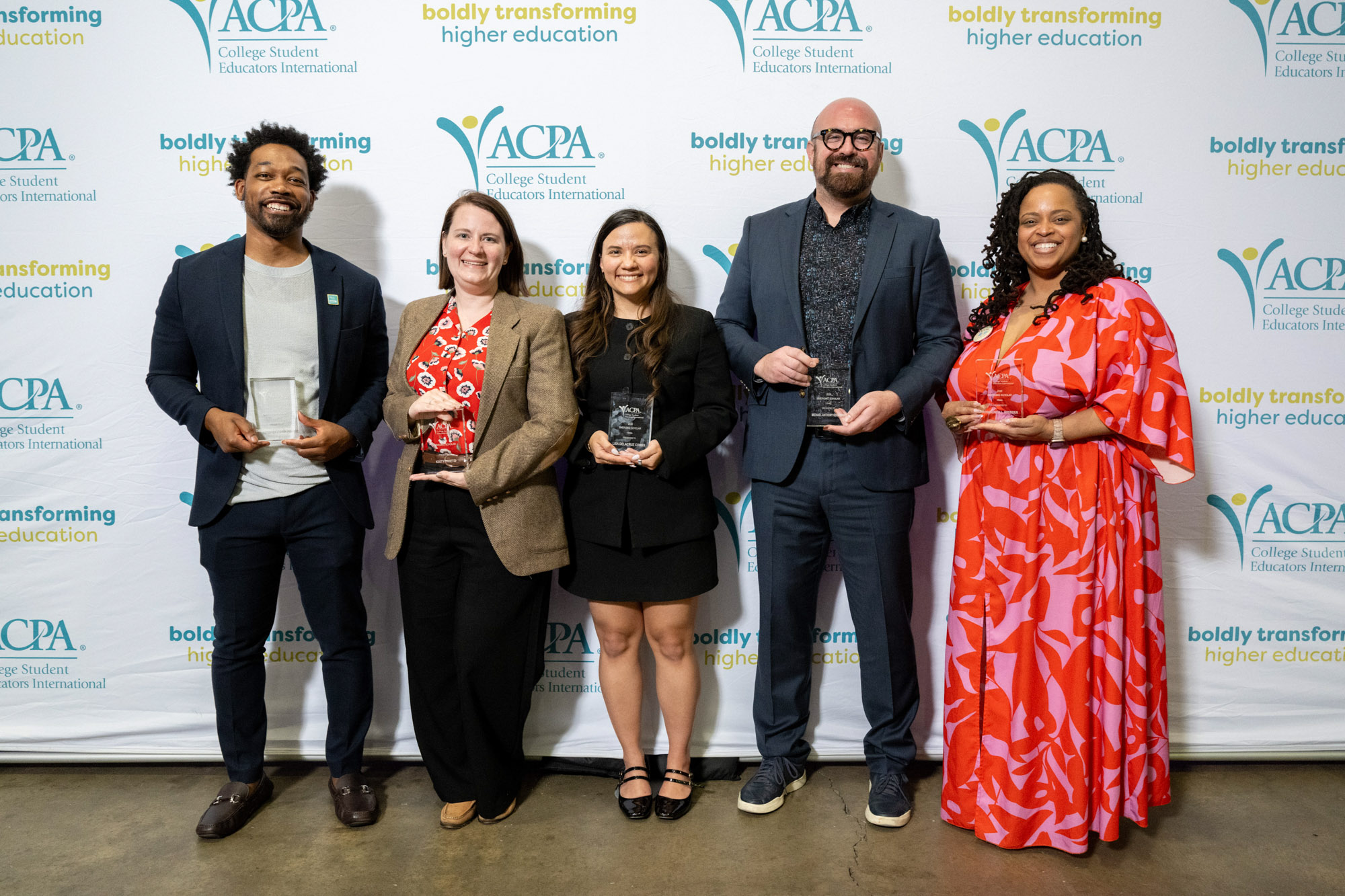 photo of all 2020 emerging scholars holding their awards at ACPA20
